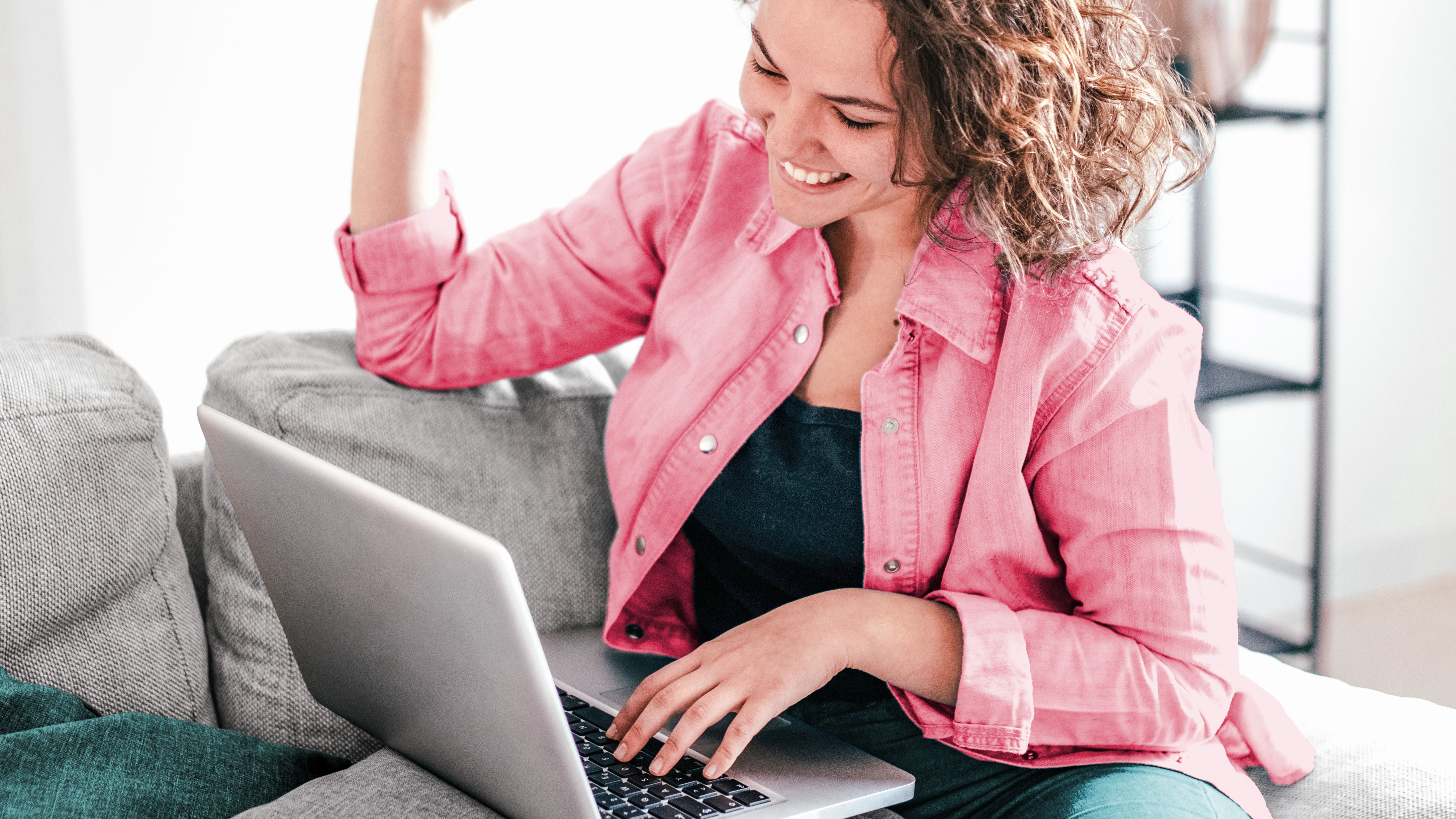 Woman shopping on secure website on laptop