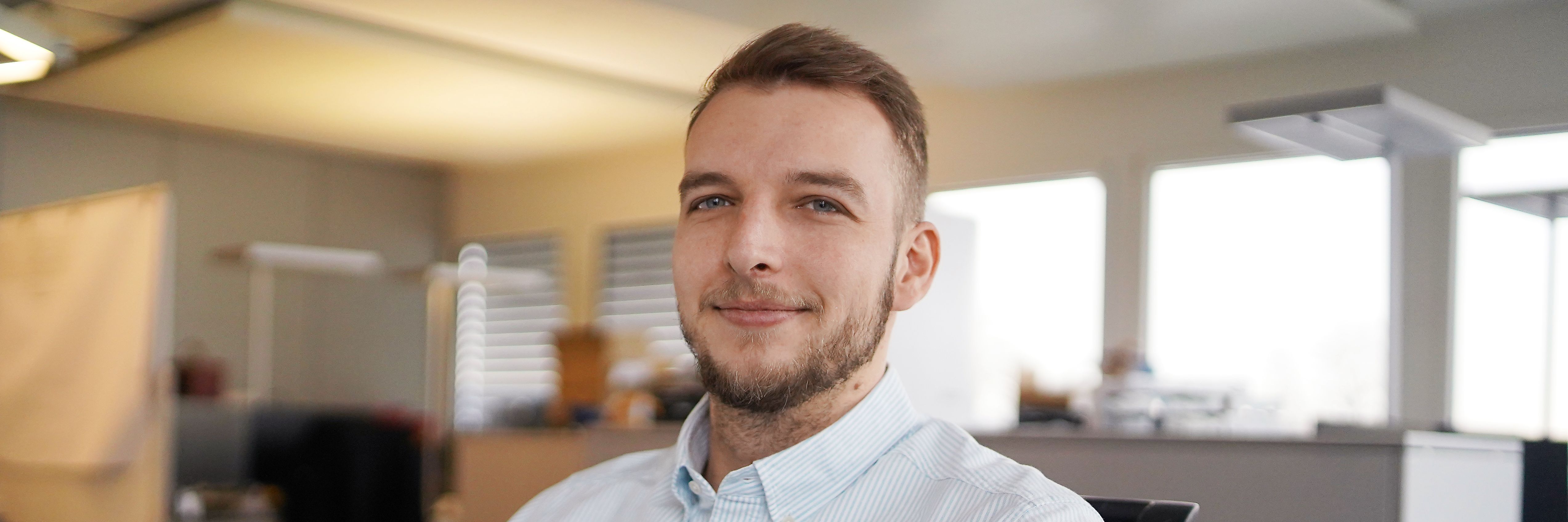 Portraitfoto von Alex, System Engineer