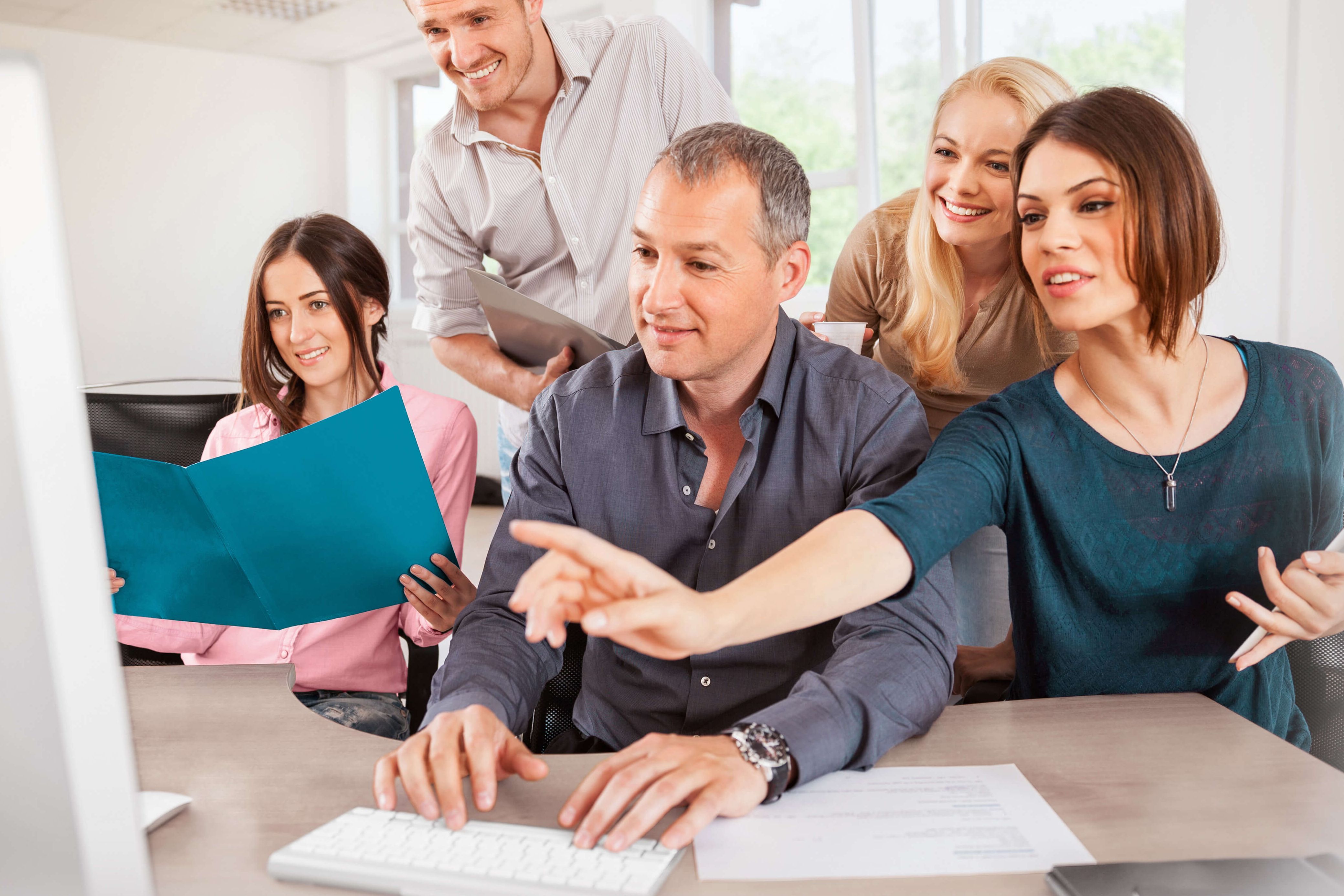 Business team builds their own website together