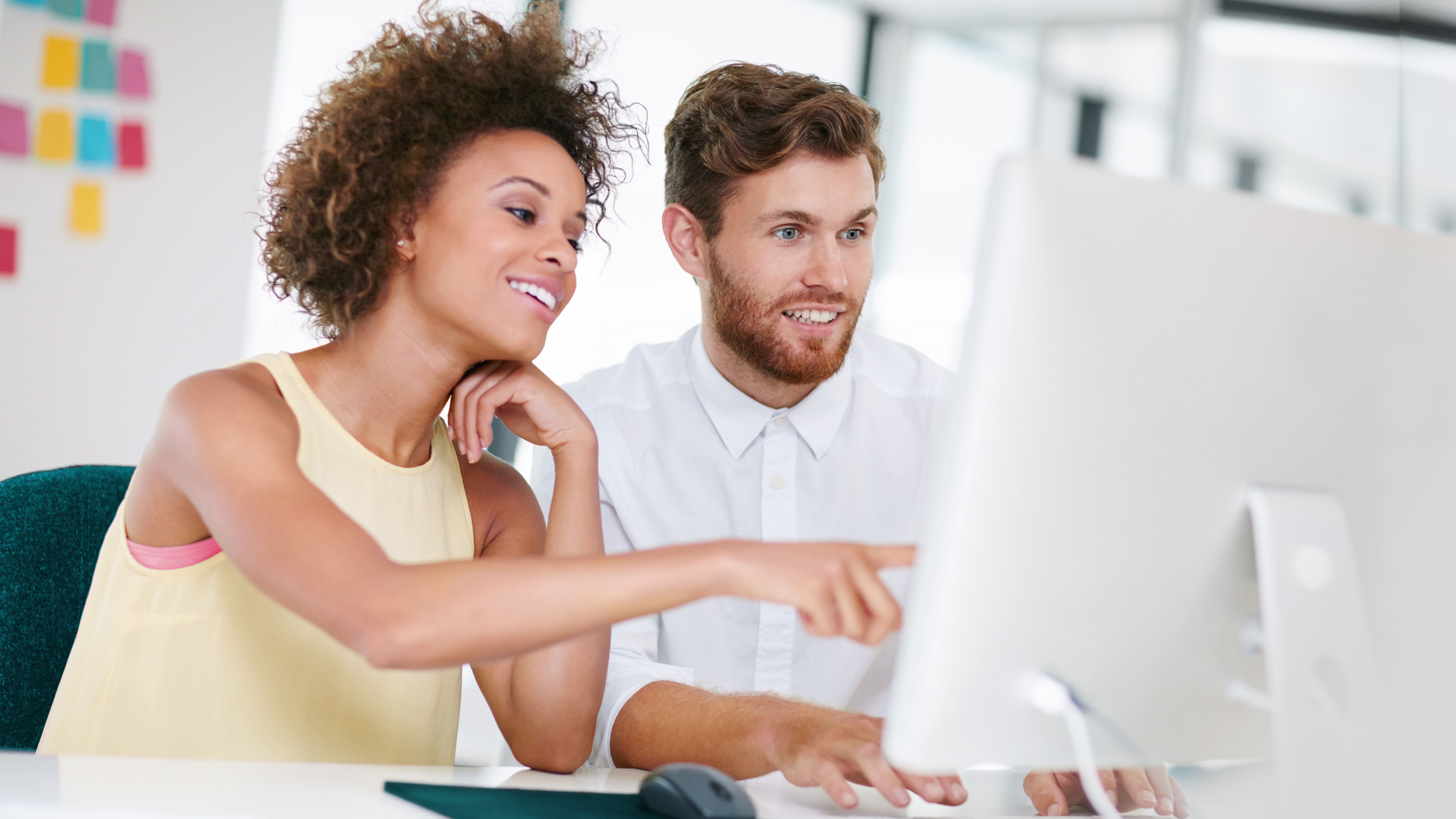 Mood picture: two people checking a new website