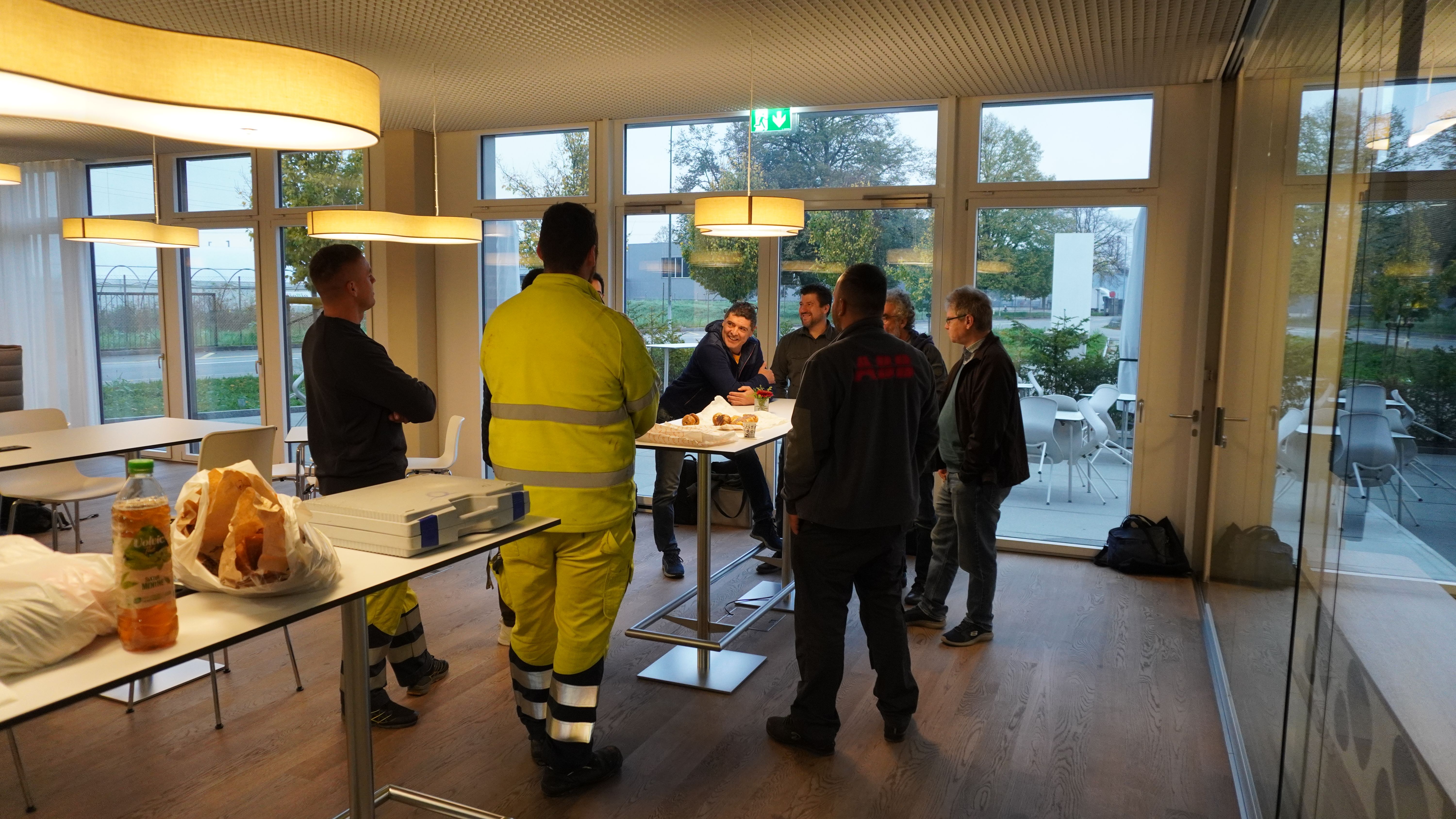Green employees at the breakfast briefing